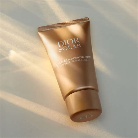 dior sun cream set with clutch|Dior sun tanning gel.